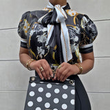 Blusa con linterna floral